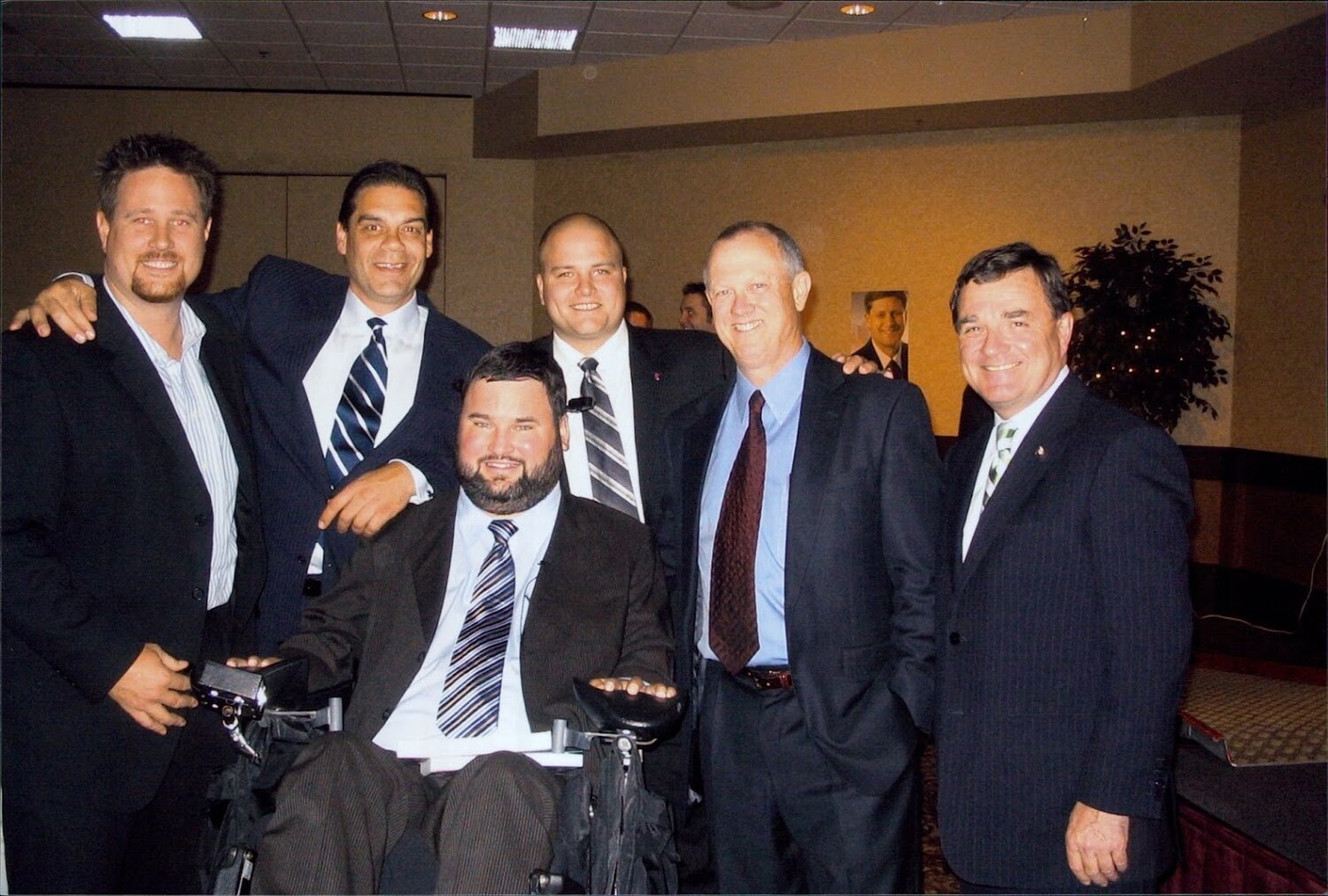 Steven Fletcher with colleagues and community members