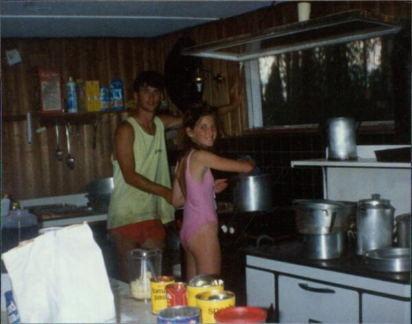 Mantario Cabin cooking up a storm with his sister in 1990